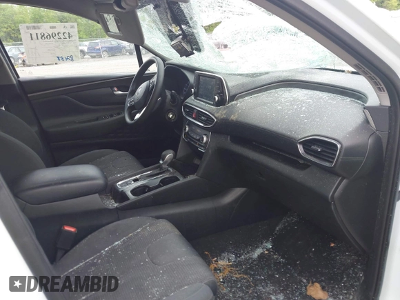 2019 Hyundai Santa Fe SE with VIN 5NMS2CAD9KH117777, listed as a IAAI auction lot 42296811 with 82,188 mi miles and . Bid and sale history available at DreamBid. Image 5.