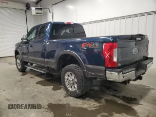 2017 Ford F-350 Lariat with VIN 1FT8X3BT5HEE16468, listed as a Copart auction lot 57251455 with 92,951 mi miles and Salvage title. Bid and sale history available at DreamBid. Image 2.