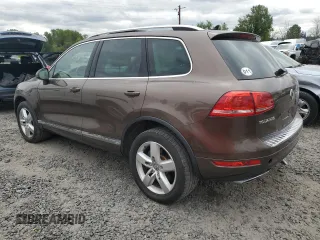 2012 Volkswagen Touareg Lux с VIN WVGEK9BPXCD012003, выставлен на аукционе Copart как лот 54910865 с пробегом 106 465 миль миль и Списание • Salvage title. История ставок и продаж доступна на DreamBid. Изображение 2.