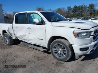 2022 Ram 1500 Laramie with VIN 1C6SRFJTXNN237199, listed as a IAAI auction lot 41705536 with 35,143 mi miles and . Bid and sale history available at DreamBid. Image 1.