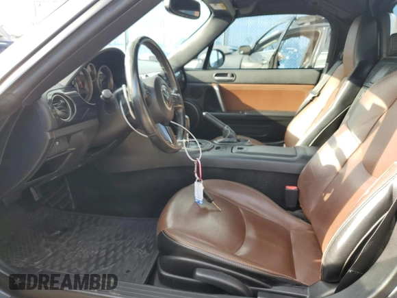 2015 Mazda MX-5 Miata Grand Touring z VIN JM1NC2PF3F0239991, wystawiony jako Copart lot #46989165 z przebiegiem 139 801 mil mil oraz Szkoda całkowita • Salvage title. Historia ofert i sprzedaży dostępna na DreamBid. Obrazek 7.
