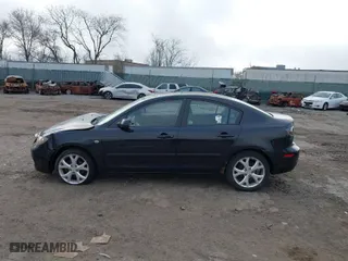 2009 Mazda Mazda3 i Touring Value with VIN JM1BK32G891195769, listed as a IAAI auction lot 41836232 with 151,544 mi miles. Bid and sale history available at carsss.com. Image 15.