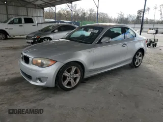 2013 BMW 1 Series 128i with VIN WBAUP7C51DVP24864, listed as a Copart auction lot 86905314 with 136,975 mi miles and Salvage Title. Bid and sale history available at carsss.com. Image 1.