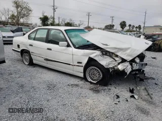 1995 BMW 5 Series 525i z VIN WBAHD6326SGK83552, wystawiony jako Copart lot #45245825 z przebiegiem 181 607 mil mil oraz Szkoda całkowita • Salvage title. Historia ofert i sprzedaży dostępna na DreamBid. Obrazek 4.