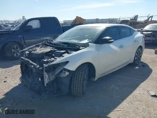 2016 Nissan Maxima 3.5 Platinum with VIN 1N4AA6AP5GC389779, listed as a IAAI auction lot 41599027 with 160,129 mi miles. Bid and sale history available at carsss.com. Image 2.