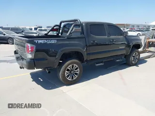 2023 Toyota Tacoma 4WD SR with VIN 3TYCZ5AN0PT110522, listed as a IAAI auction lot 41740128 with 45,115 mi miles. Bid and sale history available at carsss.com. Image 4.
