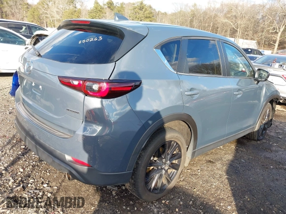 2022 Mazda CX-5 2.5 S Preferred Package with VIN JM3KFBCM1N0562277, listed as a IAAI auction lot 41421324 with 68,528 mi miles. Bid and sale history available at carsss.com. Image 4.