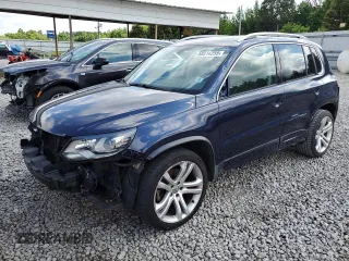 2013 Volkswagen Tiguan SE with VIN WVGBV3AX2DW611783, listed as a Copart auction lot 58514255 with 49,473 mi miles and Salvage title. Bid and sale history available at DreamBid. Image 1.