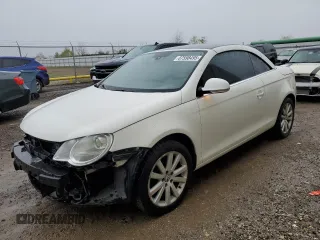 2007 Volkswagen Eos 2.0T with VIN WVWFA71F57V052000, listed as a Copart auction lot 87598495 with 128,610 mi miles and Salvage Title. Bid and sale history available at DreamBid. Image 1.