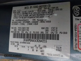 2012 Ford Fusion SE with VIN 3FAHP0HA5CR264255, listed as a IAAI auction lot 42649304 with 127,463 mi miles and . Bid and sale history available at DreamBid. Image 9.