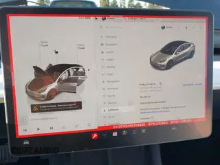 2022 Tesla Model 3 Long Range with VIN 5YJ3E1EB4NF293635, listed as a IAAI auction lot 41388234 with 28,396 mi miles and . Bid and sale history available at DreamBid. Image 7.