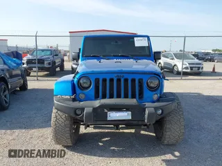 2016 Jeep Wrangler Unlimited 75th Anniversary with VIN 1C4BJWEG7GL179001, listed as a IAAI auction lot 42030735 with 123,681 mi miles. Bid and sale history available at carsss.com. Image 12.