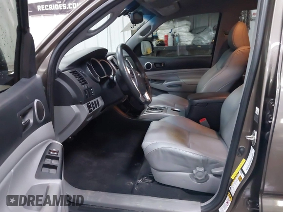2014 Toyota Tacoma PreRunner with VIN 3TMJU4GNXEM164507, listed as a IAAI auction lot 42118984 with 183,101 mi miles and . Bid and sale history available at DreamBid. Image 5.