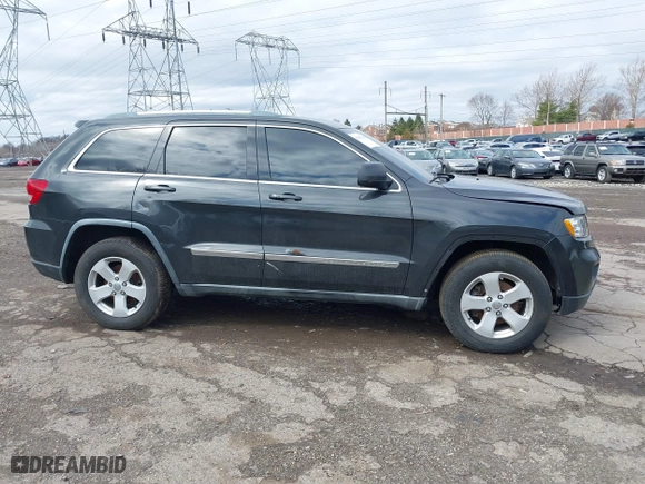2011 Jeep Grand Cherokee Laredo with VIN 1J4RR4GG7BC721483, listed as a IAAI auction lot 41810180 with 181,558 mi miles. Bid and sale history available at carsss.com. Image 14.