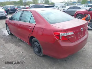 2014 Toyota Camry L with VIN 4T1BF1FK4EU832118, listed as a IAAI auction lot 42165889 with 198,882 mi miles and . Bid and sale history available at DreamBid. Image 3.
