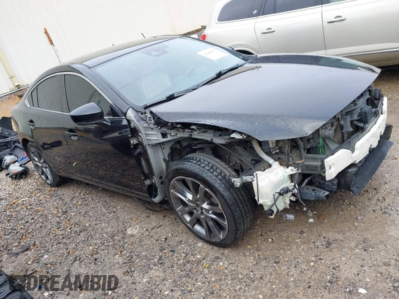 2017 Mazda 6 Grand Touring with VIN JM1GL1X54H1131788, listed as a IAAI auction lot 41640785 with 181,561 mi miles. Bid and sale history available at carsss.com. Image 1.