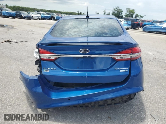 2018 Ford Fusion Titanium with VIN 3FA6P0D97JR219690, listed as a Copart auction lot 63773595 with 138,066 mi miles and Salvage title. Bid and sale history available at DreamBid. Image 6.