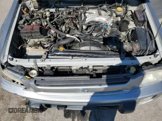2000 Infiniti QX4 with VIN JNRAR07Y1YW077992, listed as a Copart auction lot 45572015 with 202,385 mi miles and Salvage Title. Bid and sale history available at DreamBid. Image 12.