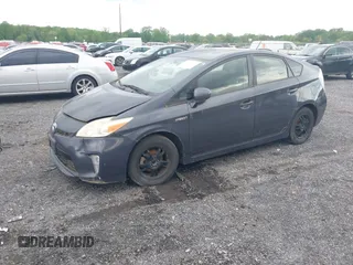 2013 Toyota Prius One with VIN JTDKN3DU8D1716993, listed as a IAAI auction lot 42202519 with 182,421 mi miles and . Bid and sale history available at DreamBid. Image 2.