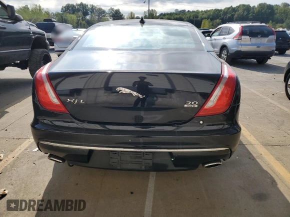 2016 Jaguar XJ Portfolio with VIN SAJWJ2GD8G8V92997, listed as a Copart auction lot 72420774 with 74,934 mi miles and Salvage title. Bid and sale history available at DreamBid. Image 6.
