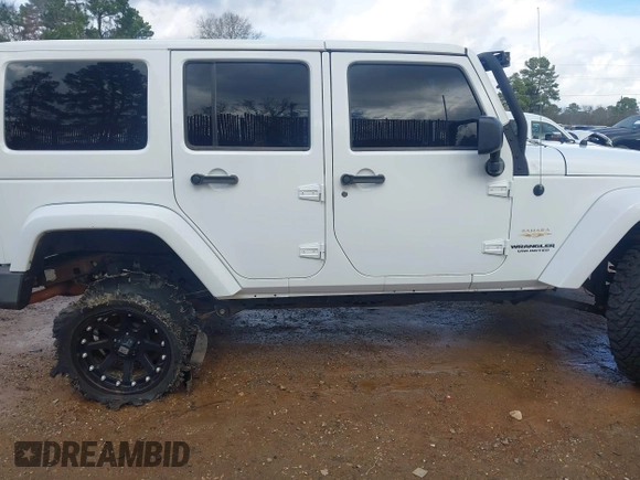 2014 Jeep Wrangler Unlimited Sahara z VIN 1C4BJWEG6EL245986, wystawiony jako IAAI lot #41498492 z przebiegiem 125 882 mil mil oraz . Historia ofert i sprzedaży dostępna na DreamBid. Obrazek 6.