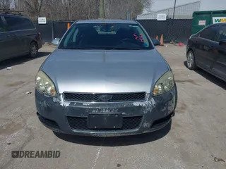 2013 Chevrolet Impala LTZ with VIN 2G1WC5E38D1235332, listed as a IAAI auction lot 41891472 with 137,567 mi miles and . Bid and sale history available at DreamBid. Image 6.