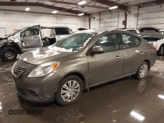2014 Nissan Versa SV with VIN 3N1CN7AP2EK455471, listed as a IAAI auction lot 41585696 with 167,366 mi miles. Bid and sale history available at carsss.com. Image 2.