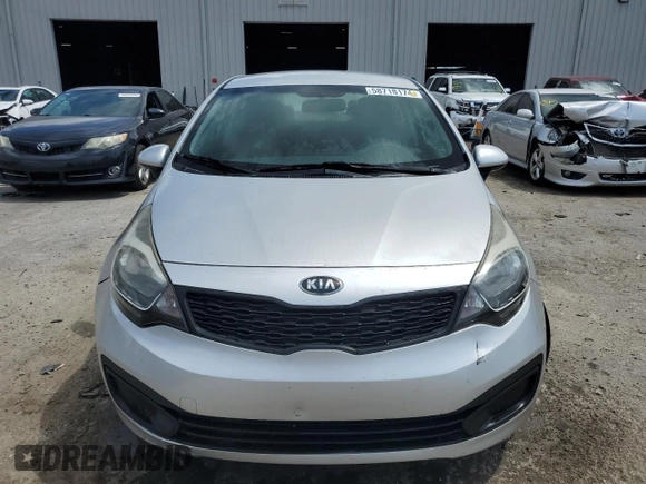 2014 Kia Rio LX with VIN KNADM4A38E6384696, listed as a Copart auction lot 58718174 with 121,760 mi miles and Salvage Title. Bid and sale history available at DreamBid. Image 5.