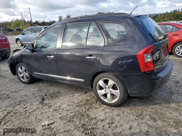 2007 Kia Rondo EX with VIN KNAFG526977118504, listed as a Copart auction lot 74013034 with 95,620 mi miles and Salvage Title. Bid and sale history available at carsss.com. Image 2.