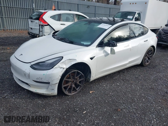 2021 Tesla Model 3 Long Range with VIN 5YJ3E1EB8MF974007, listed as a IAAI auction lot 41915513 with 107,354 mi miles and . Bid and sale history available at carsss.com. Image 2.