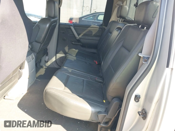 2004 Nissan Titan LE z VIN 1N6AA07B44N573319, wystawiony jako IAAI lot #42004100 z przebiegiem 196 357 mil mil oraz . Historia ofert i sprzedaży dostępna na DreamBid. Obrazek 8.