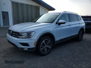 2018 Volkswagen Tiguan SEL с VIN 3VV2B7AXXJM009697, выставлен на аукционе Copart как лот 66335425 с пробегом 129 117 миль миль и Чистый • Clean title. История ставок и продаж доступна на DreamBid. Изображение 1.