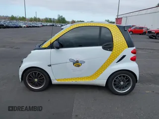 2008 Smart fortwo Pure z VIN WMEEJ31X18K126191, wystawiony jako IAAI lot #42045070 z przebiegiem 149 361 mil mil oraz . Historia ofert i sprzedaży dostępna na DreamBid. Obrazek 15.