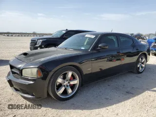 2008 Dodge Charger SRT-8 with VIN 2B3KA73W48H284076, listed as a Copart auction lot 48109825 with 156,174 mi miles and Salvage Title. Bid and sale history available at carsss.com. Image 1.