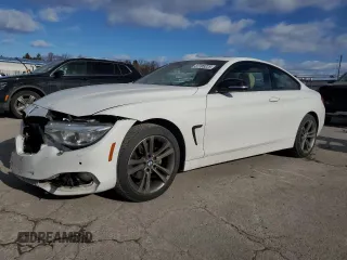 2015 BMW 4 Series 428i xDrive with VIN WBA3N5C50FK198706, listed as a Copart auction lot 87705225 with 124,083 mi miles and Salvage Title. Bid and sale history available at carsss.com. Image 1.