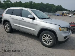 2011 Jeep Grand Cherokee Laredo with VIN 1J4RR4GG3BC581321, listed as a Copart auction lot 60893935 with 216,137 mi miles and Clean title. Bid and sale history available at DreamBid. Image 4.