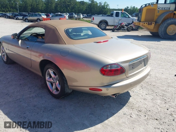 2002 Jaguar XK with VIN SAJDA42C32NA24378, listed as a IAAI auction lot 42205854 with 92,612 mi miles and . Bid and sale history available at DreamBid. Image 3.