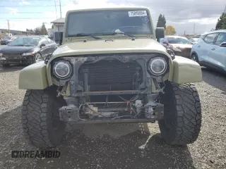 2013 Jeep Wrangler Unlimited Rubicon 10th Anniversary with VIN 1C4HJWFG4DL549065, listed as a Copart auction lot 75899594 with 127,960 mi miles and Salvage title. Bid and sale history available at DreamBid. Image 5.