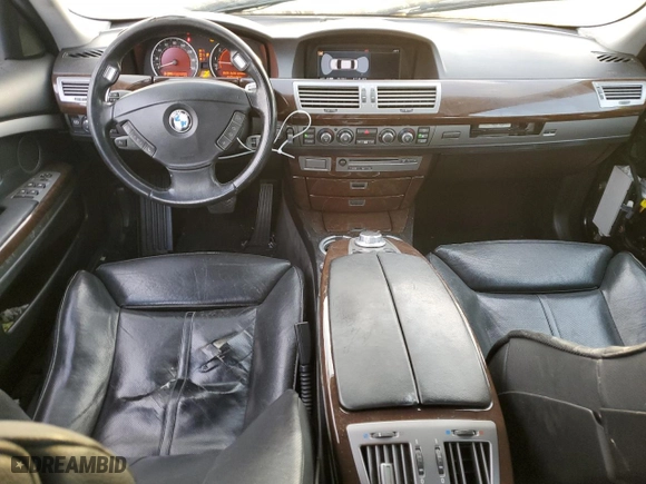 2006 BMW 7 Series 750i with VIN WBAHL83506DT05674, listed as a Copart auction lot 77176834 with 263,495 mi miles and Salvage Title. Bid and sale history available at carsss.com. Image 8.