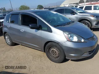 2009 Honda Fit with VIN JHMGE88239S025012, listed as a IAAI auction lot 42584028 with 163,965 mi miles and . Bid and sale history available at DreamBid. Image 1.