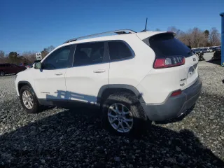 2019 Jeep Cherokee Latitude with VIN 1C4PJMCX0KD125555, listed as a Copart auction lot 48104495 with 115,138 mi miles and Clean Title. Bid and sale history available at carsss.com. Image 2.