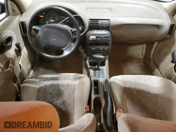 1999 Saturn SL с VIN 1G8ZK5278XZ269792, выставлен на аукционе Copart как лот 48773395 с пробегом 159 506 миль миль и Списание • Salvage title. История ставок и продаж доступна на DreamBid. Изображение 8.