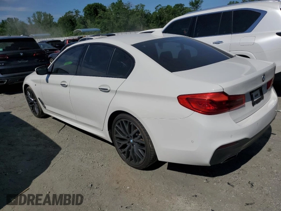 2018 BMW 5 Series 540i xDrive with VIN WBAJE7C52JG891212, listed as a Copart auction lot 58119195 with 73,770 mi miles and Salvage title. Bid and sale history available at DreamBid. Image 2.