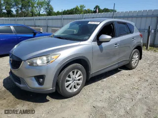 2014 Mazda CX-5 Touring with VIN JM3KE4CY9E0415402, listed as a Copart auction lot 56576114 with 181,719 mi miles and Salvage Title. Bid and sale history available at carsss.com. Image 1.