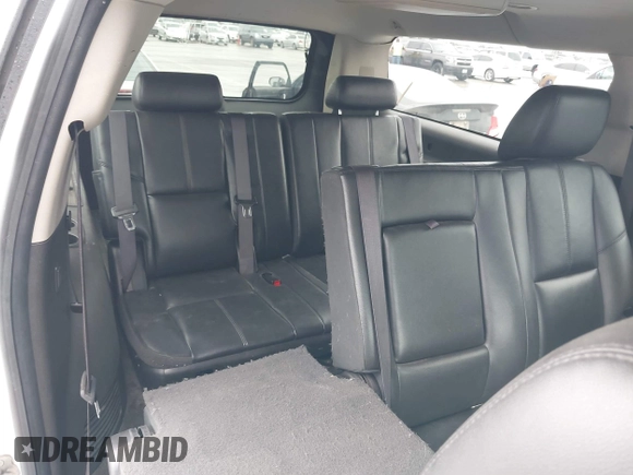 2012 Chevrolet Suburban LT with VIN 1GNSCJE00CR165813, listed as a IAAI auction lot 42494042 with 205,998 mi miles and . Bid and sale history available at DreamBid. Image 8.