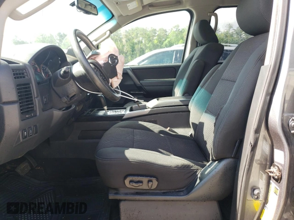 2014 Nissan Titan SV with VIN 1N6BA0ED0EN517002, listed as a Copart auction lot 57885435 with 139,910 mi miles and Salvage title. Bid and sale history available at DreamBid. Image 7.