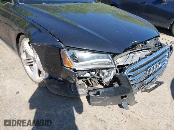 2013 Audi A8 3.0L with VIN WAURGAFD0DN005532, listed as a IAAI auction lot 42113540 with 176,635 mi miles and . Bid and sale history available at DreamBid. Image 6.