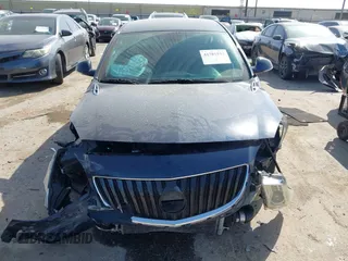 2017 Buick Regal z VIN 2G4GM5EX7H9125094, wystawiony jako IAAI lot #41781932 z przebiegiem 76 889 mil mil oraz . Historia ofert i sprzedaży dostępna na DreamBid. Obrazek 6.