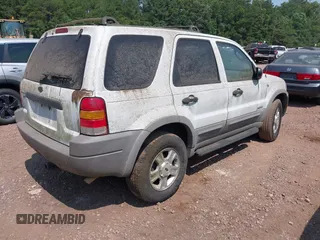 2002 Ford Escape XLT Choice with VIN 1FMYU03122KE08742, listed as a IAAI auction lot 42363962 with 299,455 mi miles and . Bid and sale history available at DreamBid. Image 4.