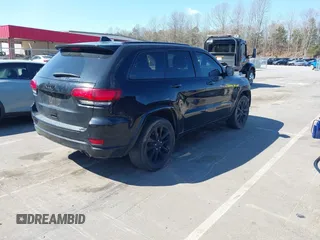 2017 Jeep Grand Cherokee Altitude with VIN 1C4RJEAG2HC880691, listed as a IAAI auction lot 41892221 with 116,008 mi miles and . Bid and sale history available at DreamBid. Image 4.